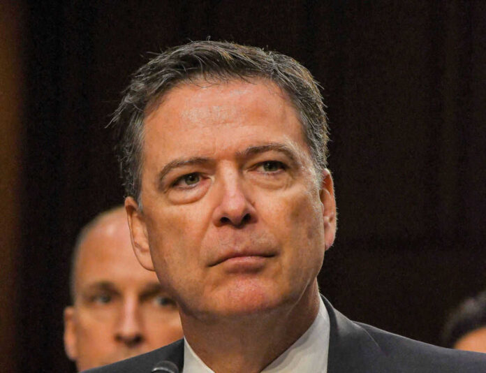 Man in suit looking serious at event