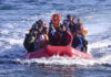 Boat Tragedy Kills 42 – Libyan Coast Slammed A group of people in a red inflatable boat on the ocean