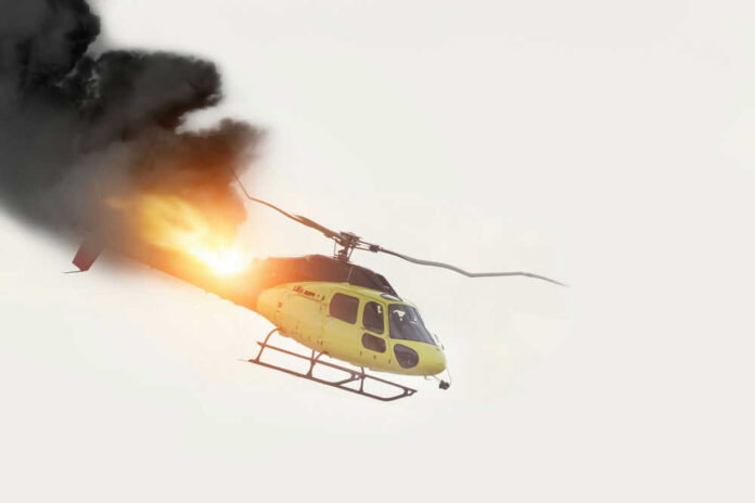 Helicopter on fire with smoke in the sky